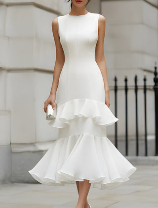 Sleeveless tiered ruffle midi dress by Christine Brewer displayed on a mannequin, featuring flowy fabric and layered ruffle details.