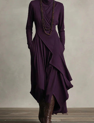 Solid color high-neck long-sleeved casual maxi dress by Christine Brewer, featuring an irregular hem and relaxed fit.