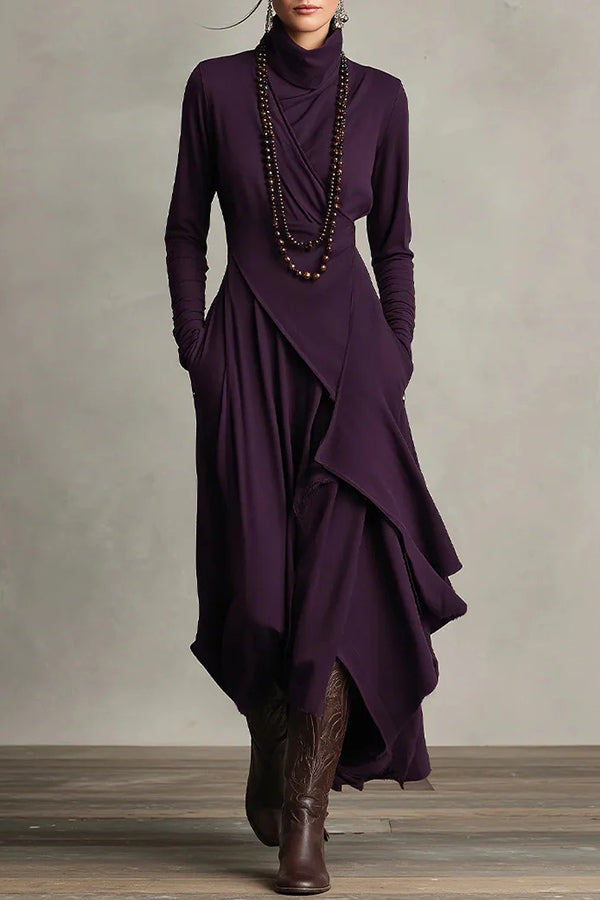 Solid color high-neck long-sleeved casual maxi dress by Christine Brewer, featuring an irregular hem and relaxed fit.