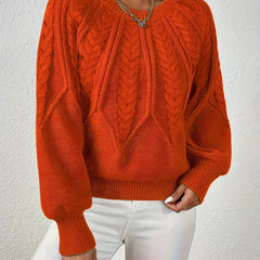 Navy Naomi classic timeless sweater by Christine Brewer, featuring a cozy knit and crew neckline, displayed on a neutral background.