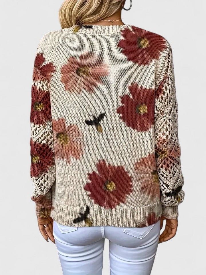 Whitney floral V-neck cardigan for women by Christine Brewer, featuring a colorful floral pattern and lightweight knit fabric.