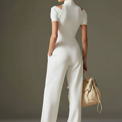 Women’s white cotton blend short sleeve wide-leg jumpsuit, stylish and comfortable pants by Christine Brewer, shown on a model.