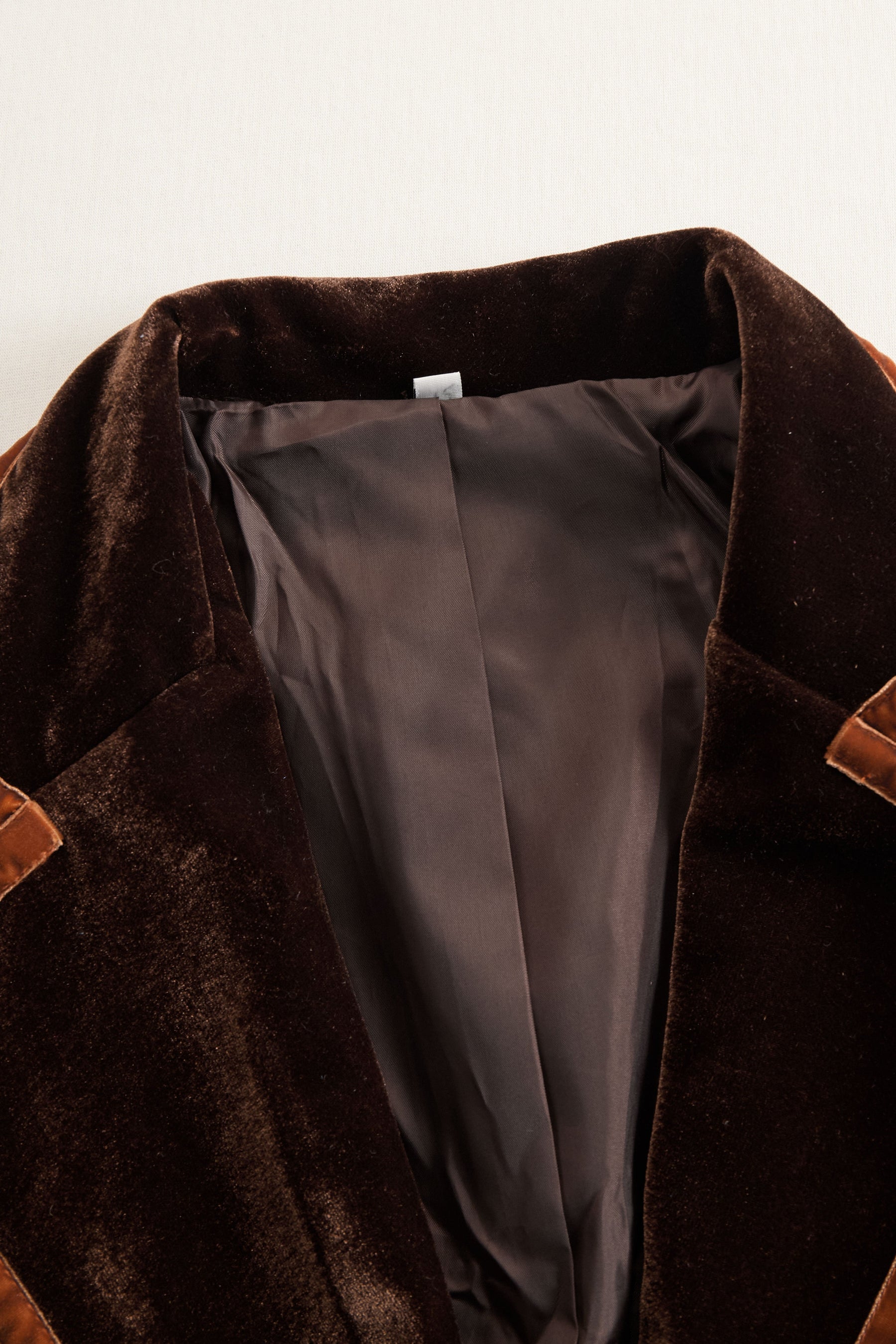 Brown velvet colour-block lapel coat with pockets by Christine Brewer, showcasing a stylish, tailored outerwear design.
