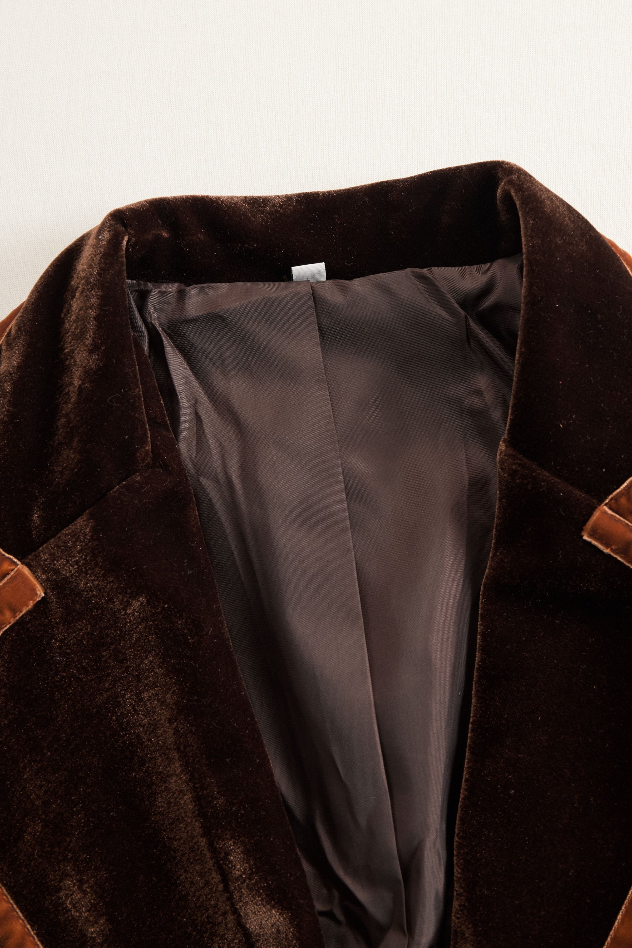 Brown velvet colour-block lapel coat with pockets by Christine Brewer, showcasing a stylish, tailored outerwear design.