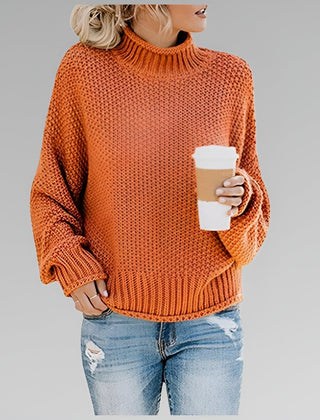 Amy Winifred ribbed orange sweater for women by Christine Brewer, showcasing a cozy, fitted sweater with textured ribbing.
