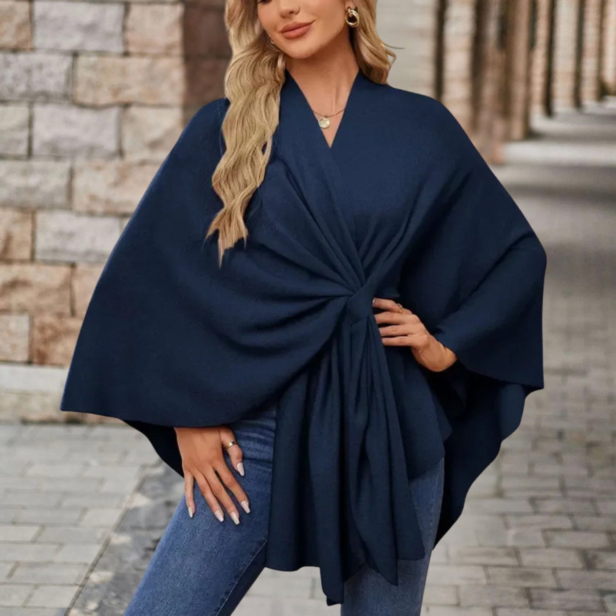 Christine Brewer Cecilia knit poncho for women, stylish top in soft, cozy fabric with a relaxed fit and draped design.
