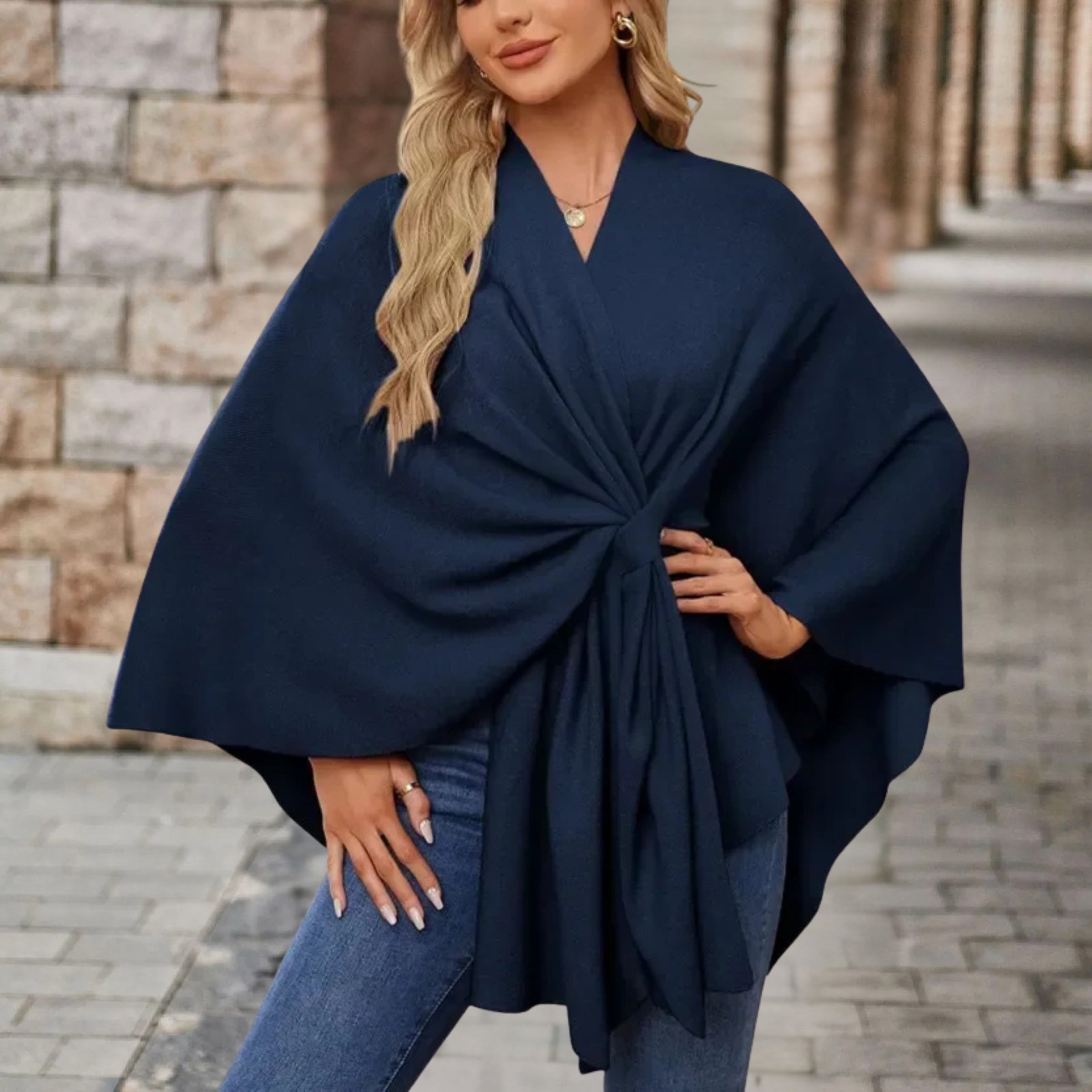 Christine Brewer Cecilia knit poncho for women, stylish top in soft, cozy fabric with a relaxed fit and draped design.