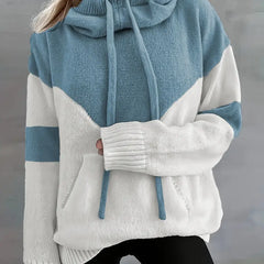 Colorblock hoodie for women by Melissa, featuring a stylish pullover design and vibrant color blocking, displayed on a woman.