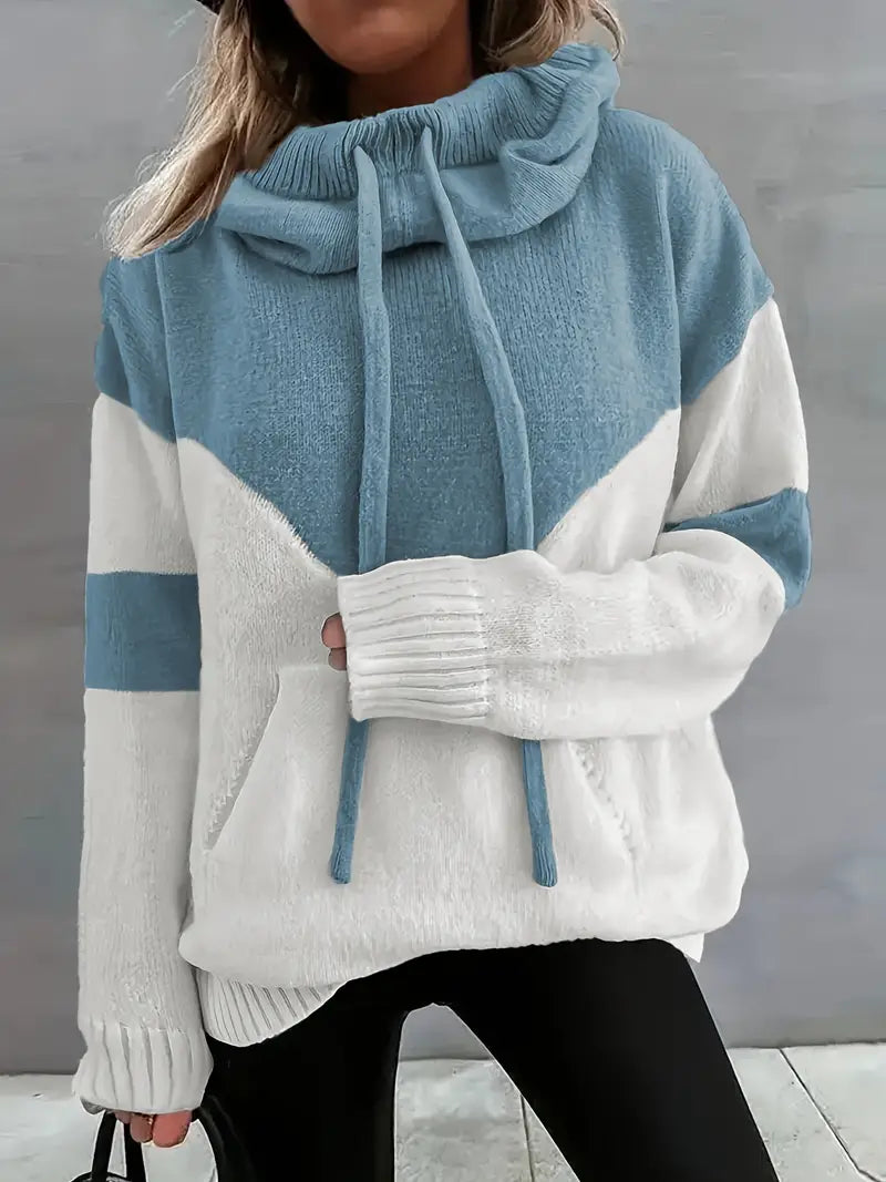 Colorblock hoodie for women by Melissa, featuring a stylish pullover design and vibrant color blocking, displayed on a woman.