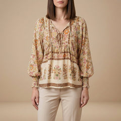 Apricot floral long sleeve linen summer blouse for women by Christine Brewer, featuring lightweight, breathable fabric and elegant design.