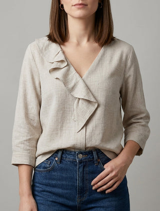 Apricot V-neck denim ruffle summer blouse for women by Christine Brewer, featuring a stylish and breathable top with ruffle details.