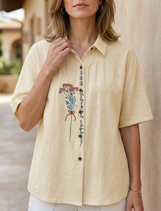 Apricot floral short sleeve denim blouse for women by Christine Brewer, featuring a stylish summer top with feminine floral pattern.
