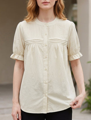 Apricot summer blouse for women by Christine Brewer featuring puff sleeves and a denim button front, perfect for warm weather.