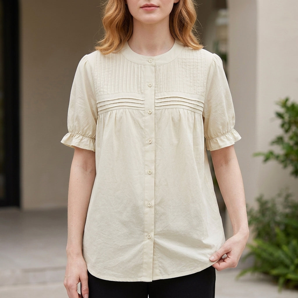 Apricot summer blouse for women by Christine Brewer featuring puff sleeves and a denim button front, perfect for warm weather.