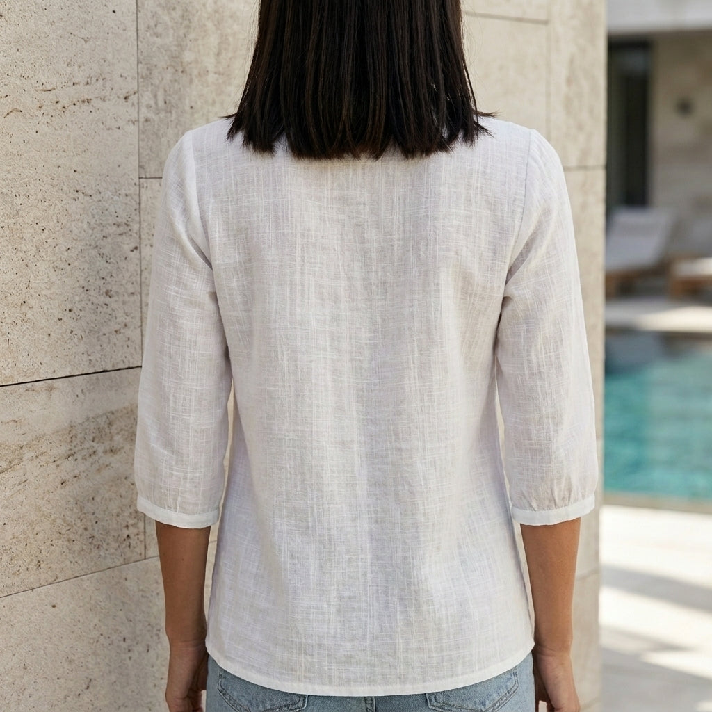 Back view of Christine Brewer summer women's lace blouse with square neckline, lightweight and stylish top for warm weather.