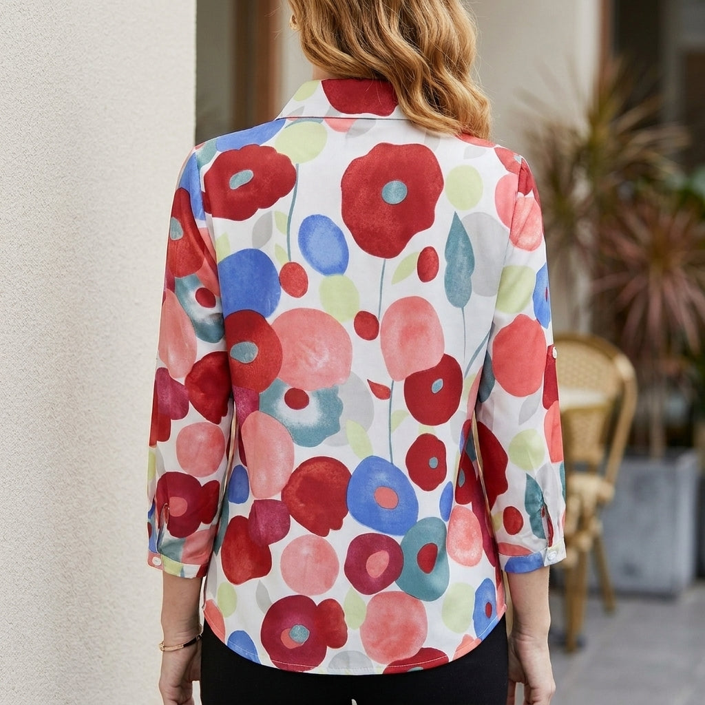 Back view of Christine Brewer floral long sleeve denim summer blouse for women, featuring a relaxed fit and vibrant floral pattern.