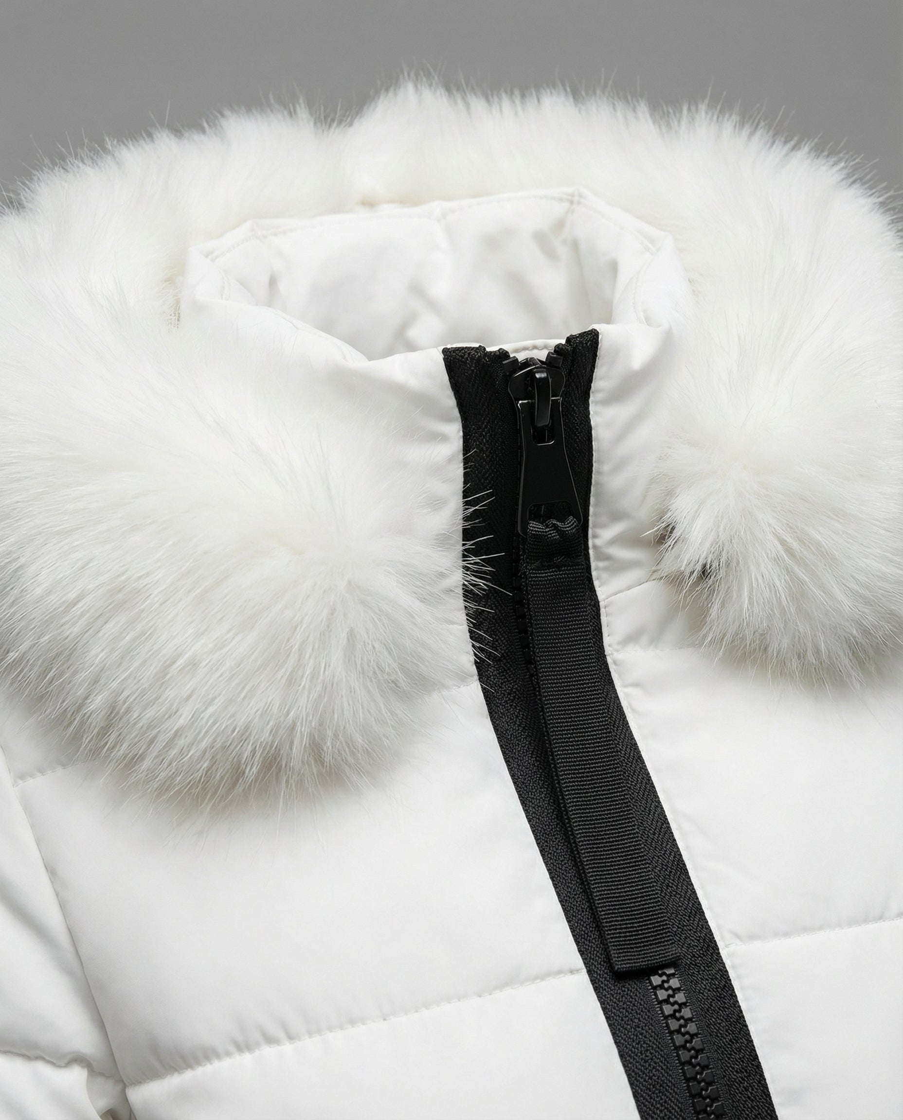 Close-up of Christine Brewer Sadie women's cosy puffer jacket showing quilted texture and high-quality fabric details.