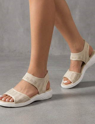 Beige knit ankle-strap sandals for women by Christine Brewer, featuring open toes and stylish ankle straps.