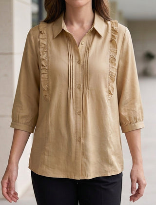 Beige denim ruffle summer blouse for women by Christine Brewer, featuring a stylish and light fabric design.