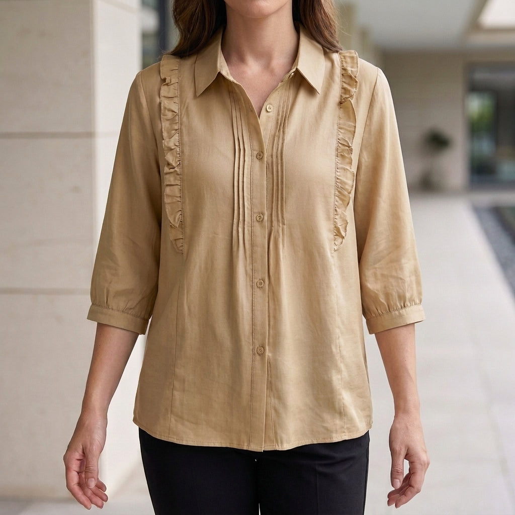 Beige denim ruffle summer blouse for women by Christine Brewer, featuring a stylish and light fabric design.
