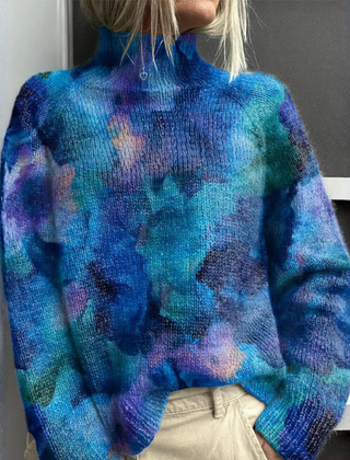 Pink ribbed sweater for women by Christine Brewer, featuring a close-up of the Angelina knit design and cozy fabric texture.