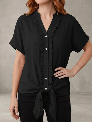 Black women's summer blouse with V-neck, denim fabric, and ruffle details, casual top by Christine Brewer.