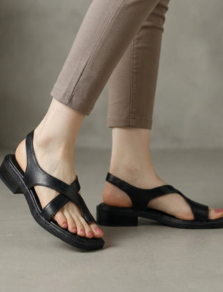 Black square-toe block-heel criss-cross sandals for women by Christine Brewer, showcasing stylish design and comfortable fit.
