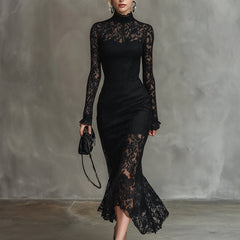 Black lace fishtail maxi dress by Christine Brewer, featuring elegant evening dress design with fitted bodice and flowing skirt.