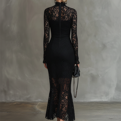 Black lace fishtail maxi dress by Christine Brewer, elegant evening dress with intricate lace details and fitted silhouette.