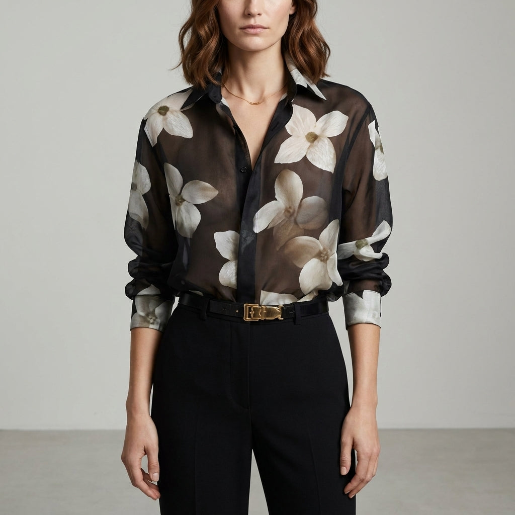 Black floral long sleeve summer blouse for women by Christine Brewer, featuring a stylish, lightweight design and feminine pattern.