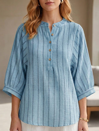 Blue striped linen summer blouse for women by Christine Brewer, featuring a button front and relaxed fit.