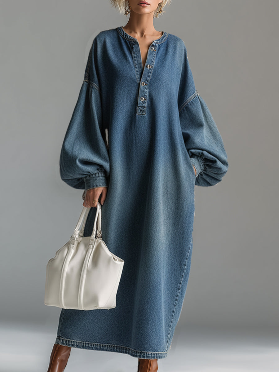 Blue denim maxi dress by Christine Brewer featuring a relaxed fit, sleeveless design, and flowing length perfect for evening wear.
