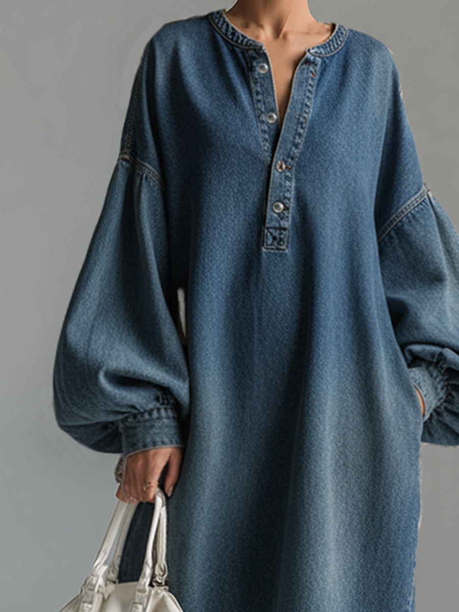 Blue denim maxi dress by Christine Brewer, featuring a flowing silhouette and casual-chic style, perfect for evening or daytime wear.