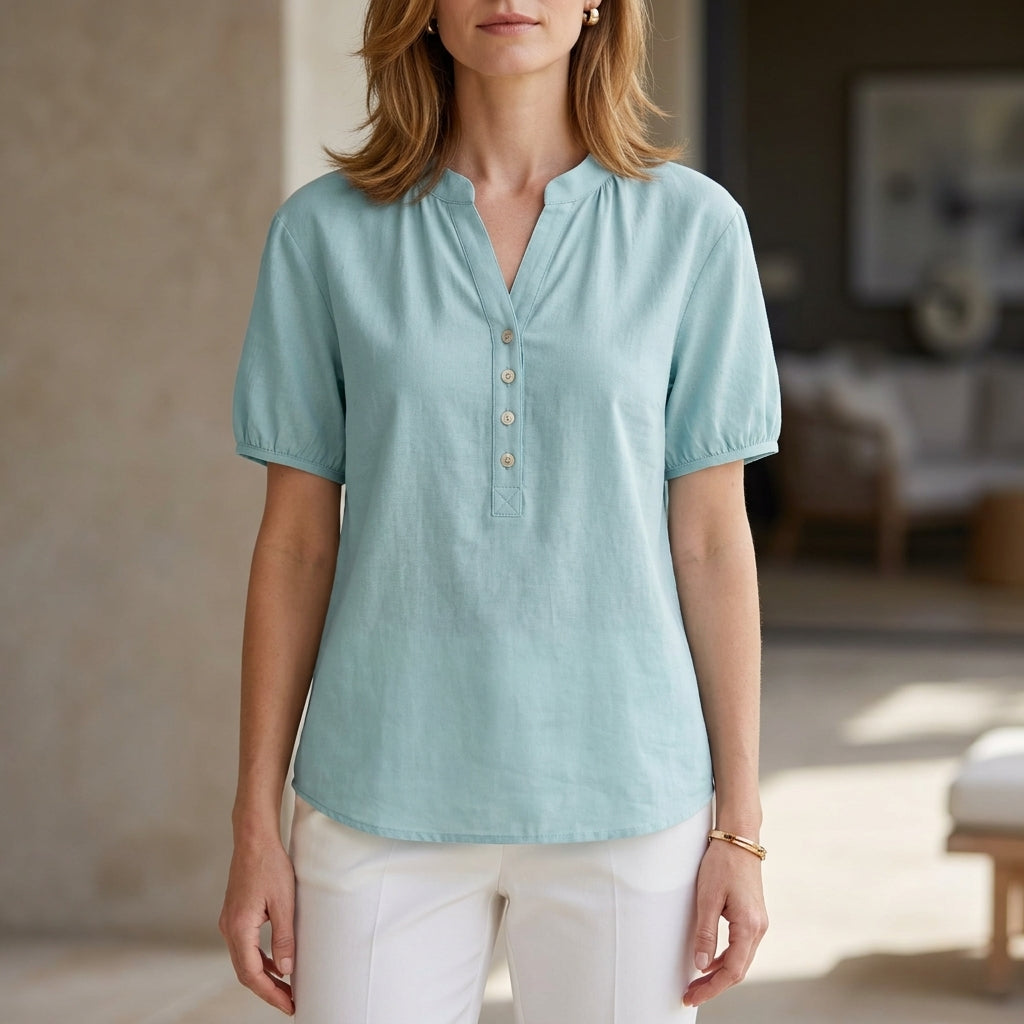 Blue denim summer blouse for women with puff sleeves and button front from Christine Brewer, lightweight and stylish top.