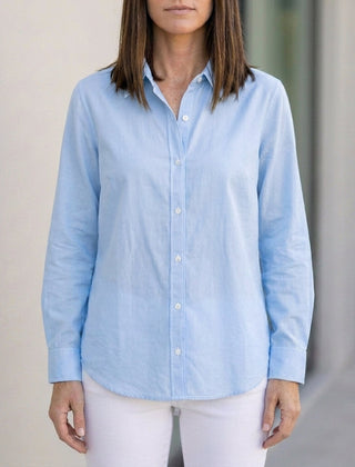 Blue linen summer blouse for women with button front, by Christine Brewer, stylish and breathable top for warm weather.