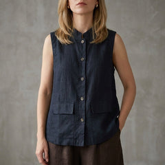 Blue sleeveless denim summer blouse for women with button front by Christine Brewer, featuring a casual, stylish top.