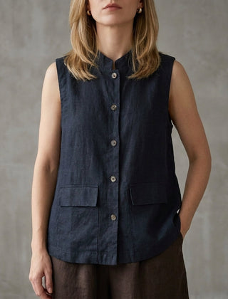 Blue sleeveless denim summer blouse for women with button front by Christine Brewer, featuring a casual, stylish top.