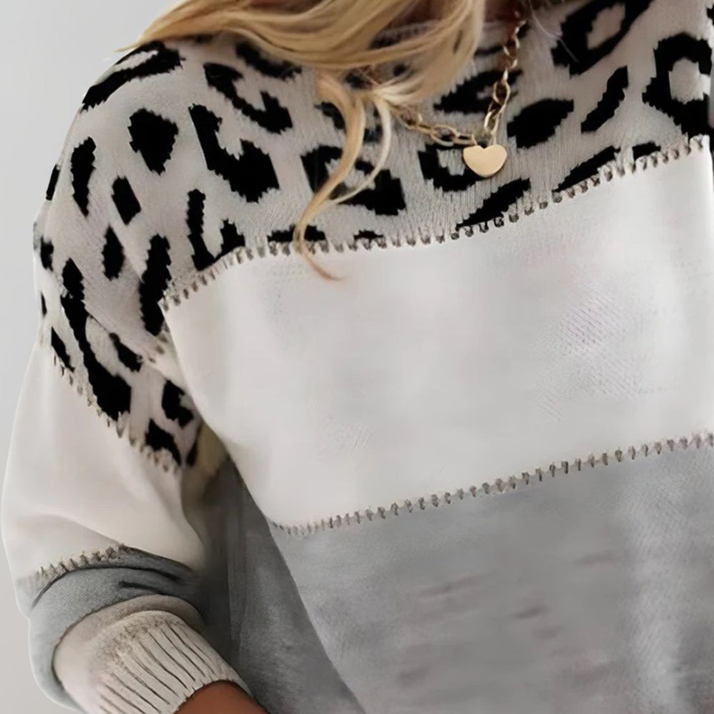Alicia leopard print graphic sweater for women by Christine Brewer, featuring a stylish gray Laura design with bold animal print.