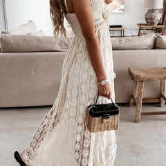 White lace strappy long dress by Christine Brewer, resort-style design with intricate lace details and flowing silhouette.