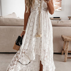 White lace strappy long dress by Christine Brewer featuring resort-style design and elegant flowing fabric.