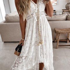 White resort-style lace strappy long dress by Christine Brewer, featuring elegant design and flowing fabric.