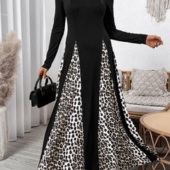 Black retro high waist leopard print patchwork dress by Christine Brewer, featuring bold animal print and vintage-inspired design.
