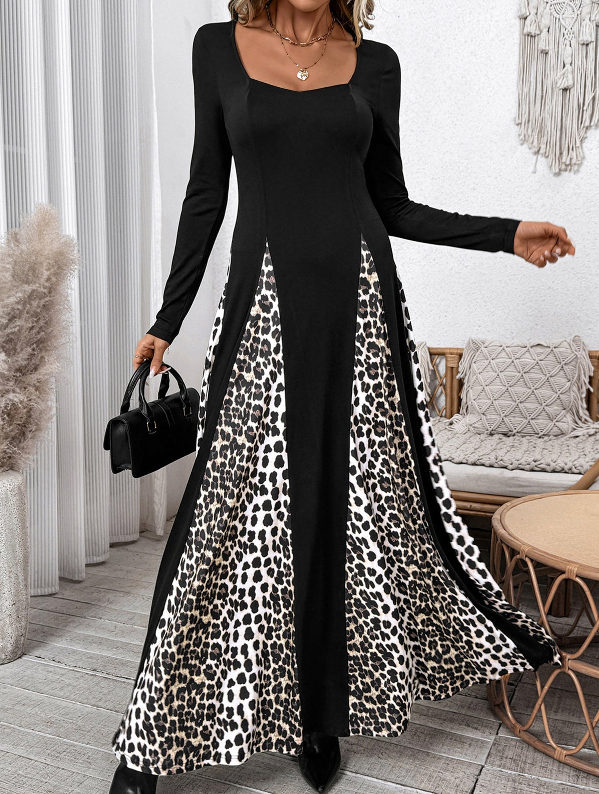 Black retro high waist leopard print patchwork dress by Christine Brewer, featuring bold animal print and vintage-inspired design.