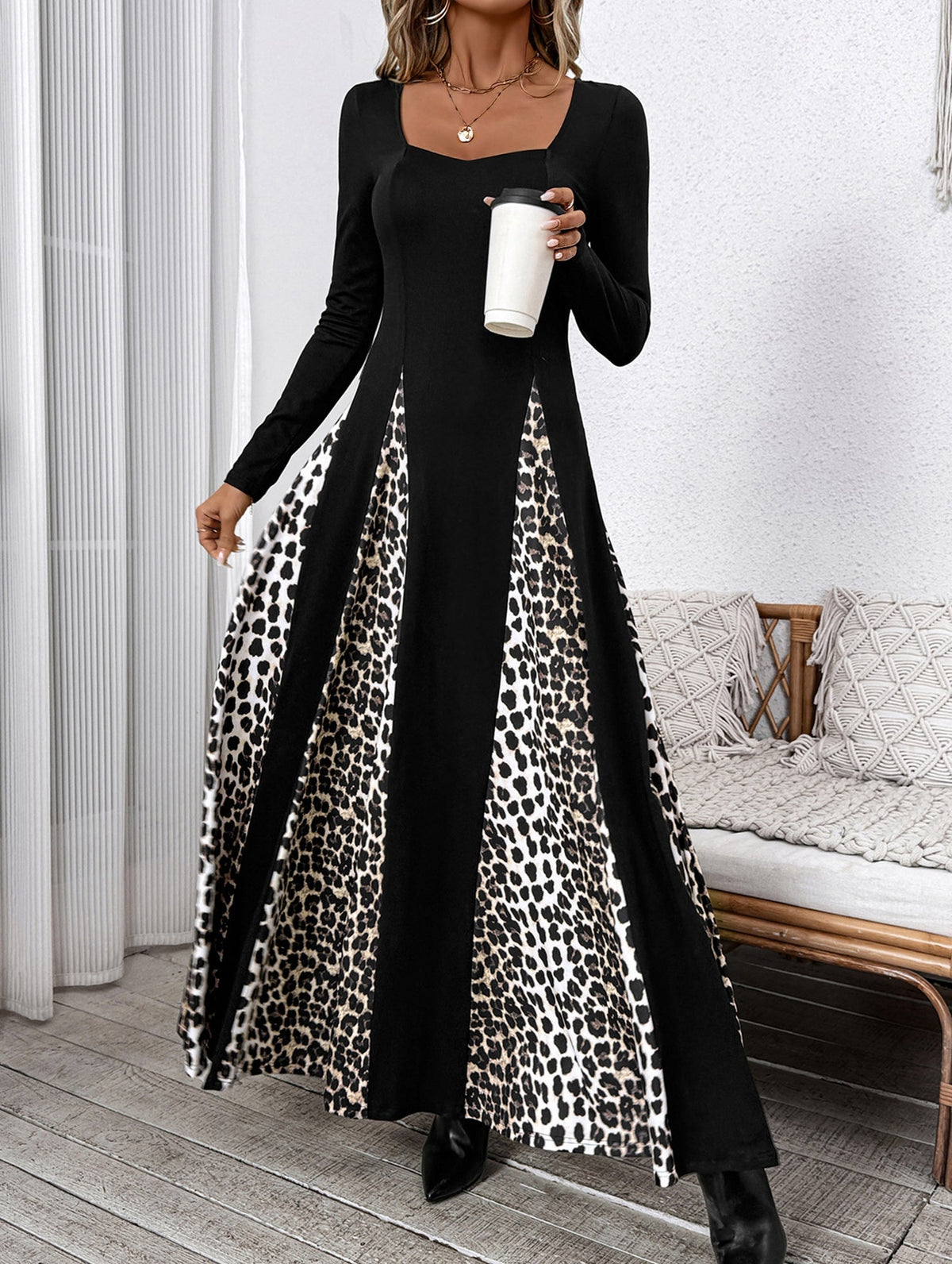 Black retro high waist leopard print patchwork dress by Christine Brewer, showcasing a stylish vintage-inspired dress with bold animal print.