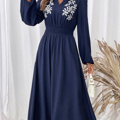 Light blue embroidered waist V-neck dress by Christine Brewer, showcasing elegant detailing and a flattering fit.