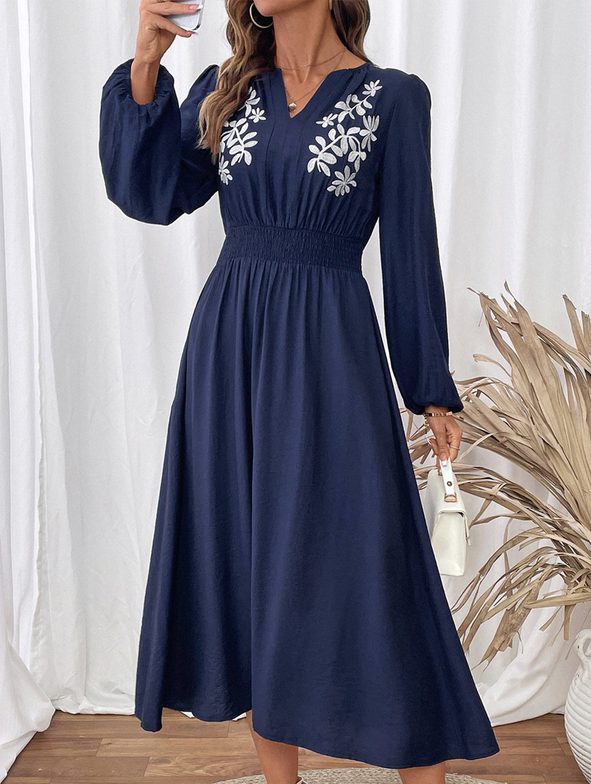 Light blue embroidered waist V-neck dress by Christine Brewer, showcasing elegant detailing and a flattering fit.