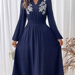 Light blue embroidered waist V-neck dress by Christine Brewer, showcasing intricate embroidery and elegant fit.