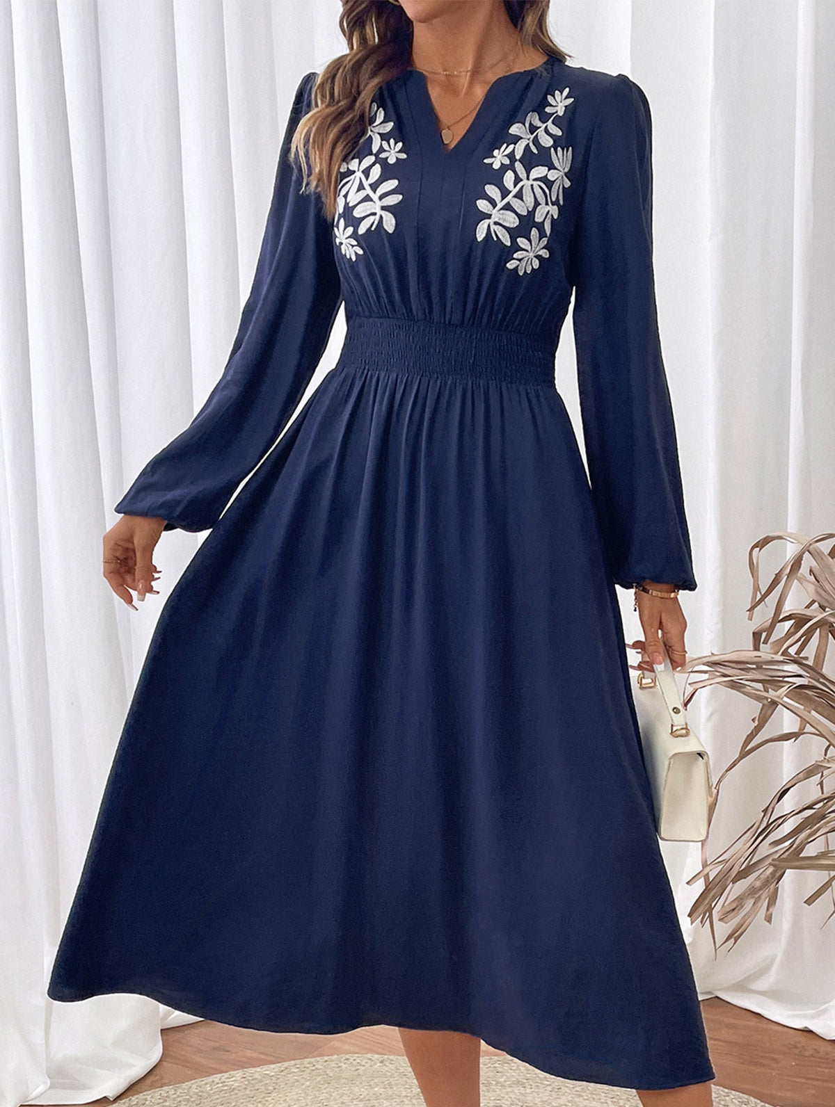 Light blue embroidered waist V-neck dress by Christine Brewer, featuring elegant detailing and a flattering fit.