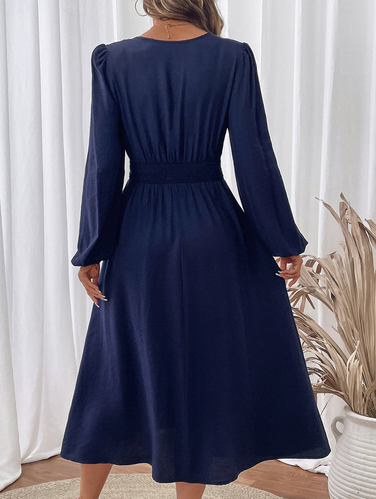 Light blue embroidered waist V-neck dress by Christine Brewer, featuring elegant detailing and a flattering fit.