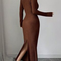 White cross neck knit slim-fit dress by Christine Brewer, featuring a stylish fit and design, displayed on a hanger.